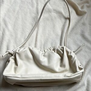 oversize cloud clutch With shoulder handle